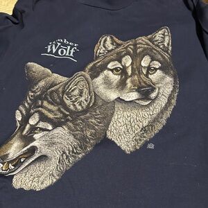 2 men’s L and XL wolf t-shirts